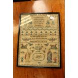 Needle point sampler by Mary Ann Catchpole 1857, with script, flower,