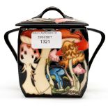 A Moorcroft twin handled square biscuit barrel and cover in the Toadstool Carnival pattern,