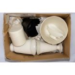 A box of Wedgwood cream coloured bowls and vases
