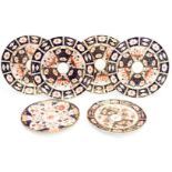 Four Royal Crown Derby ten inch plates 2451 (Imari pattern) together with two eight inch plates