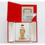 Cartier, a circa 1980 18ct gold Cartier Santos wristwatch,