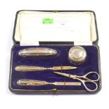 An early 20th century silver manicure set, Birmingham 1912, maker William Adams Ltd,