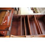 A Victorian mahogany single door bookcase, the upper section fitted with a single glazed door,