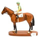 Beswick model of Lester Piggot up on a bay racehorse (3) ,