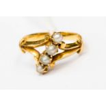 A 19th Century high carat gold and four natural pearl ring, probably 22ct, size P½, 5.