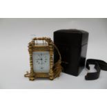 Rapport of London gilt brass French carriage clock in leather case,