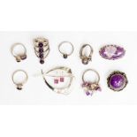 A collection of amethyst jewellery to include brooches - silver mounted and a collection of six