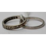An 18ct white gold half eternity ring size K along with a platinum (stamped PLAT) wedding band size