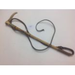 A late Victorian bone handled bamboo riding crop,