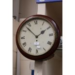 An early 20th Century mahogany circular wall clock - no pendulum or key