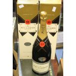 Two Moet and Chandon Formula One silver trophy Magnum Champagne