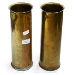 A pair of brass Trench Art shell vases, with flared rims,