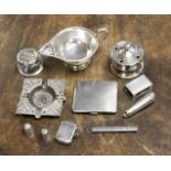 A collection of silver items including ink well, ash tray,