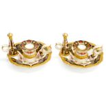 A pair of boxed Royal Crown Derby Old Imari 1128 pattern Winster candlesticks and snuffers,