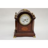 An Edwardian table/mantle clock with inlaid detail, enamel dial,