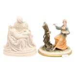 A resin figurine 'Pieta' with Michael - Aclvs - Bonart? across the Mother of Christ's body;