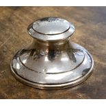 A George V silver Capstan Inkwell, maker Deakin and Francis, the hinged lid engraved initials,