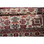 Persian carpet with Geo design, cream ground, tasseled edge,