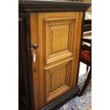A Victorian oak pedestal side cabinet, fitted with a single two-panelled door,