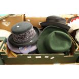 A collection of assorted modern hats,