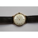 A Tudor Rolex 1960s 9ct gold wristwatch with date window