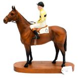 A Beswick model of Jockey Pat Taaffe mounted on Arkle,