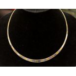 A yellow and white metal alternate graduated link collar necklace, marked 750,