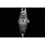 A 1930 silver/white metal and marcasite ladies cocktail watch