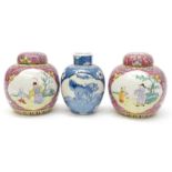 A pair of Famille Rose late 19th early 20th century ginger jars with painted panels of deities and