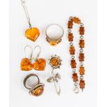 An amber and silver braclet, brooch,