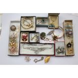 A Monet bangle, a collection of vintage brooches, paste necklace,