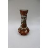 A Meiji period Kutani vase with signature to base, panels with bird,