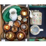 A box of lustre ware with Wedgwood Majolica plates, famille rose teapot,