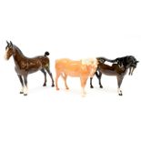 Beswick Palamino horse with tail attached to rear leg, and neck bent in opposite direction,