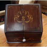 A late 19th/early 20th Century writing cabinet with inlay on mahogany