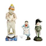 A pair of mid 19th century porcelain figures, possibly French,