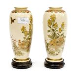 A pair of Japanese shouldered form Satsuma vases, decorated with birds and blossom,