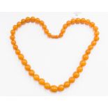 A butterscotch amber bead necklace