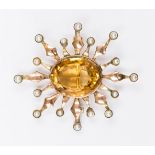 An Edwardian citrine and seed pearl star ray brooch/pendant,