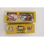 Two boxed Pelham puppets,