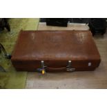 A leather suitcase - Revalation