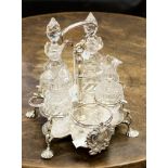 A George II silver cruet stand, Rococo form,