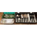 Boxed fish eaters, a cruet tray and a child's knife, fork, spoon set,