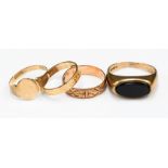 Three 9ct gold rings weighing approx 4.