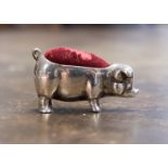 A silver novelty pin cushion in the form of a Pig