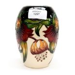 A Moorcroft vase in the Anna Lilly pattern, designed by Nicola Slaney, shape 102/5,