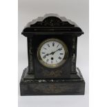 A slate mantle clock,