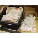 Three boxes of assorted table linen
