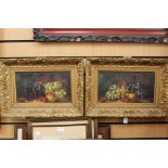 A pair of still life oil pictures of fruit in gilt frames (2-) indestinctly signed
