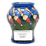 A Moorcroft vase in the Eleven Pipers pattern, designed by Kerry Goodwin, shape 146/3,